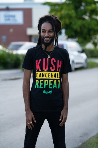 Cooyah Jamaica.  Men's Kush, Dancehall graphic tee in black. Screen printed with rasta colors design. Jamaican Clothing Brand. IRIE