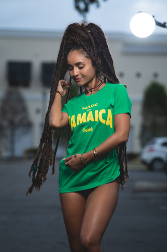 Cooyah Clothing.  Made in Jamaica women's green graphic tee with yellow print.  Ringspun cotton, short sleeve, crew neck t-shirt.  Jamaican clothing brand.
