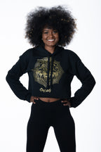 Cooyah Jamaica. Women's black Lion Mandala cropped hoodie with metallic gold print. Jamaican clothing brand.
