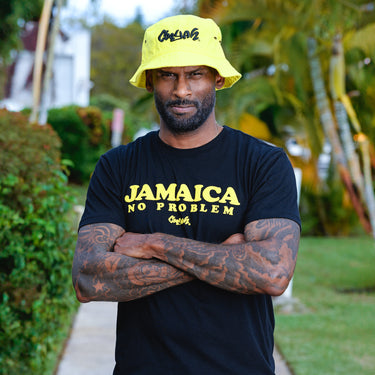 Cooyah Bucket Hat with Jamaican No Problem graphic tee.