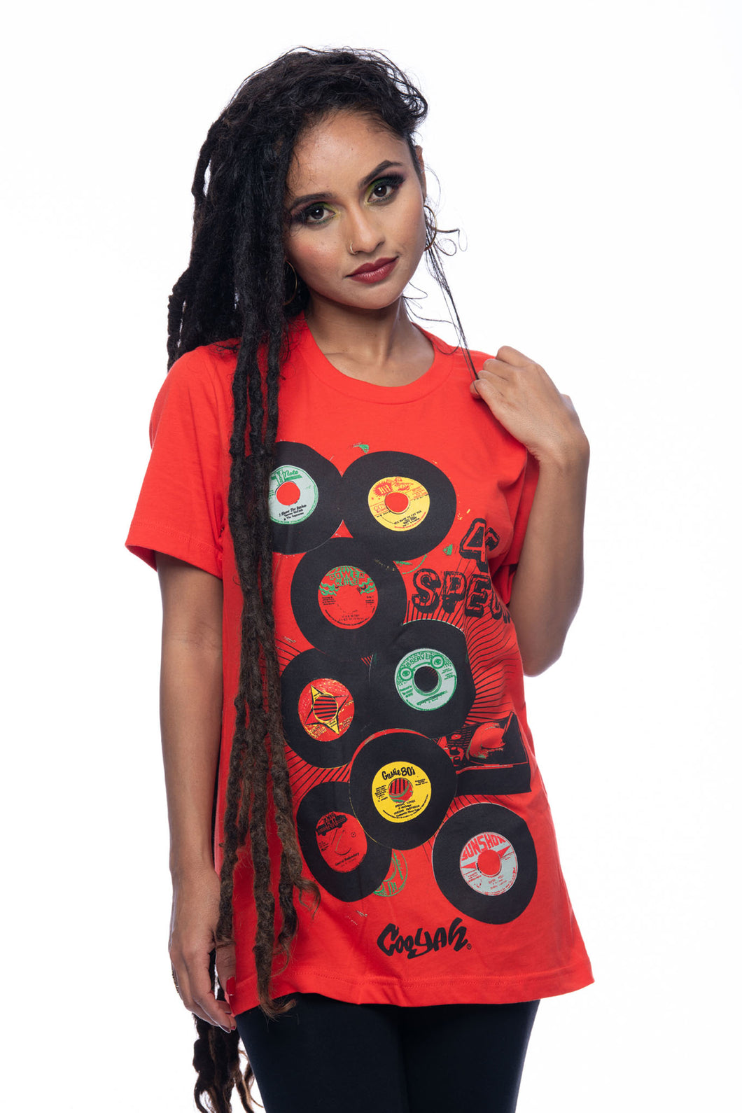 Cooyah Jamaica. Women's short sleeve graphic tee with 45 RPM Vinyl records screen printed on the front. Vintage reggae and rocksteady style. Red boyfriend-fit Shirt, short sleeve, ringspun cotton. Jamaican streetwear clothing brand. IRIE