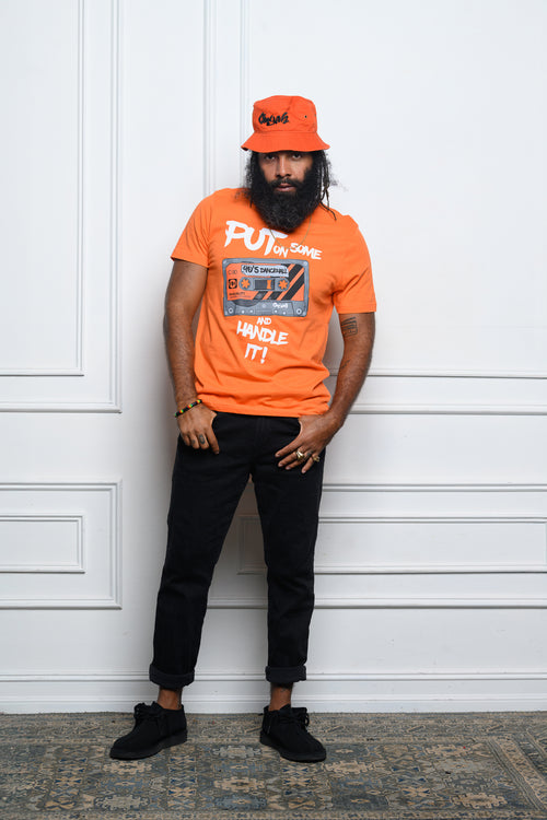 Cooyah Men's 90's Dancehall cassette tape graphic tee in orange.  Screen printed on soft, 100% ringspun cotton.  