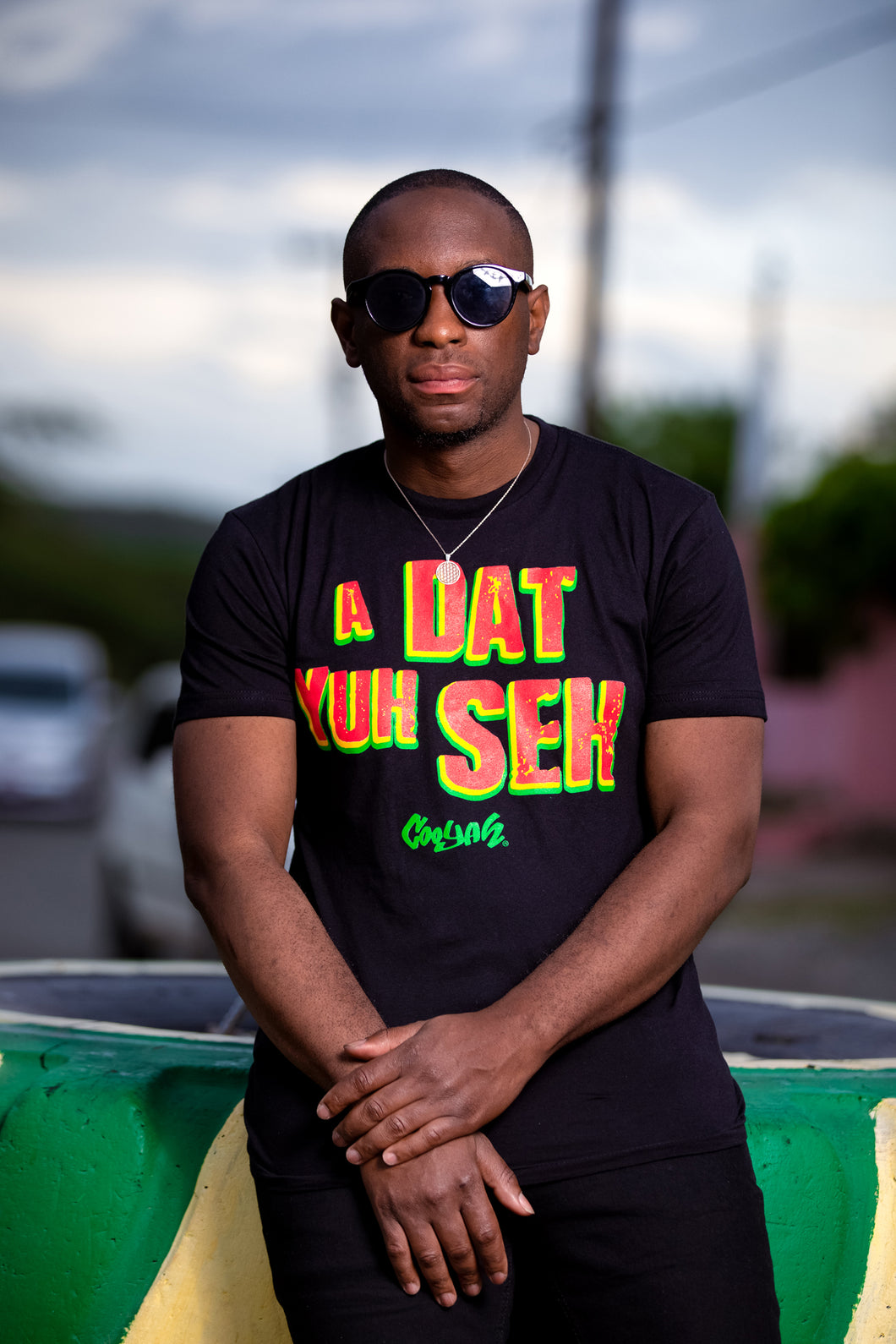 Cooyah Jamaica.   A Dat Yuh Seh Men's Jamaican patois graphic tee.  Screen printed in reggae colors.  Caribbean menswear since 1987.  IRIE