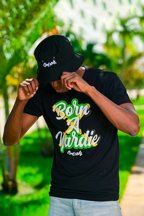 Cooyah Jamaica. Born A Yardie graphic tee. Men's short sleeve, 100% ringpun cotton. Jamaican streetwear clothing brand. 876