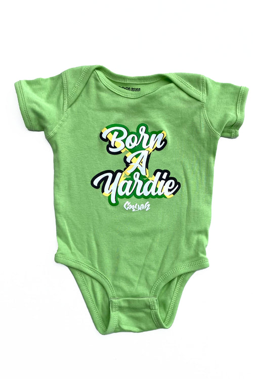 Cooyah Jamaica.  Born A Yardie Baby Onesie in green.  We are a Jamaican owned clothing brand since 1987.  