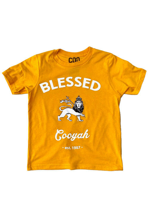 Cooyah Blessed Lion of Judah Kid's Graphic Tee in gold.  Screen printed on soft, 100% ringspun cotton.  We are a Jamaican owned clothing company.  Established in 1987.  IRIE