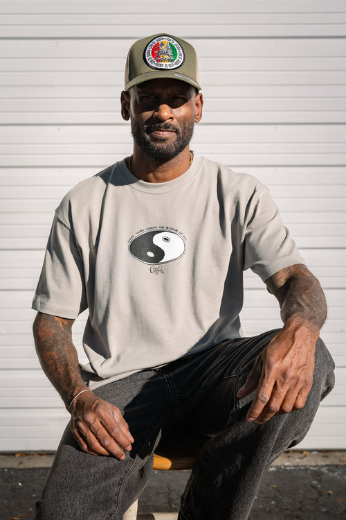 Front view of Cooyah Yin Yang graphic tee featuring a vintage hand-drawn design, screen printed on heavyweight 100% ringspun cotton with a relaxed boxy fit.