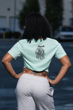Load image into Gallery viewer, Cooyah Jamaica. Women&#39;s African Warrior graphic tee in blue. Short sleeve, soft, ringspun cotton.
