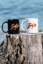 Cooyah Jamaica. Irie Rasta Ceramic Mug. Reggae style coffee, tea, drink wear.  Available in black and white with a rasta colors design.