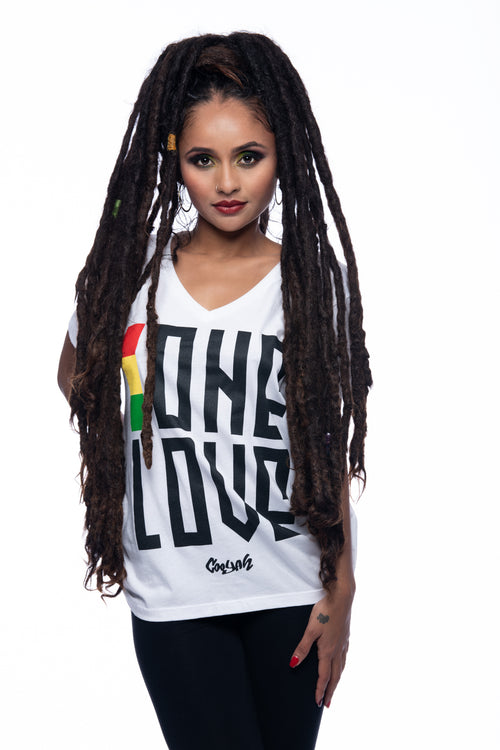 Cooyah Jamaic - Women's One Love Graphic Tee.   Screen printed in rasta colors on short sleeve v-neck t-shirt.  As a Jamaican owned clothing brand since 1987, we take pride in bringing you this classic top. Don't wait, get yours now!