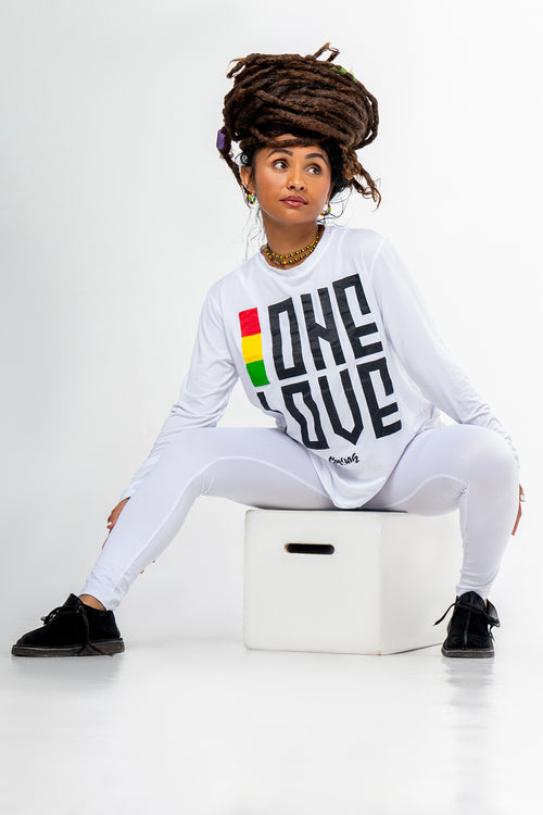 Cooyah Jamaica - Women's One Love dri-fit shirt.  Long sleeve, upf 50+ sun protection.  Irie, reggae style.  As a Jamaican owned clothing brand since 1987, we take pride in bringing you this classic piece. Don't wait, get yours now!