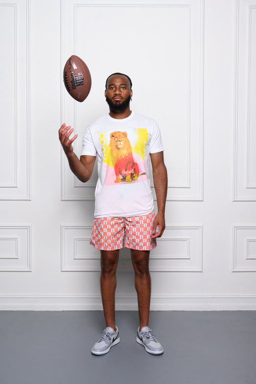 Cooyah Jamaica. Standing Lion Men's Graphic Tee featured on NFL player Tre'Quan Smith. We are a Jamaican streetwear clothing brand established in 1987.