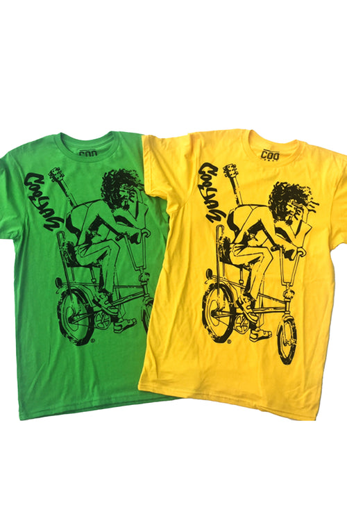 Cooyah Jamaica. Men's Simmer Down T-Shirt featuring a Rastaman on a bicycle design. Ring Spun Cotton, Short Sleeve Green and Yellow Tee. Jamaican streetwear clothing brand.