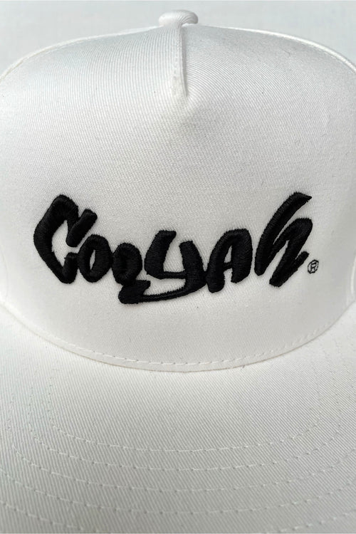 Cooyah Embroidered snapback cap in white.  As a Jamaican owned clothing brand since 1987, we take pride in bringing you this classic piece. Don't wait, get yours now!