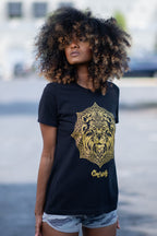 Cooyah Jamaica. Women's black Lion Mandala tee with gold graphics. Jamaican streetwear clothing brand.