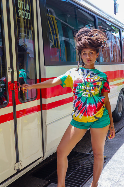 Cooyah Clothing. Women's RASTA Tie-Dye graphic tee with Paradise Found Jamaica Design. Ringspun cotton, short sleeve, crew neck. Jamaican reggae brand.