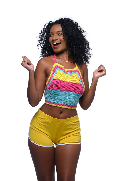 Cooyah Jamaica.  Women's beach outfit.  Crochet halter top with athleisure shorts in mustard yellow.  Irie