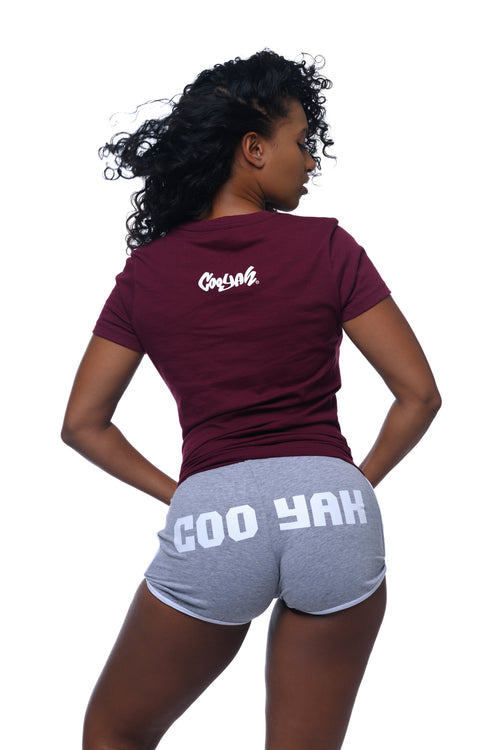 Cooyah Jamaica.  Womens logo athleisure shorts and African Mask graphic tees.