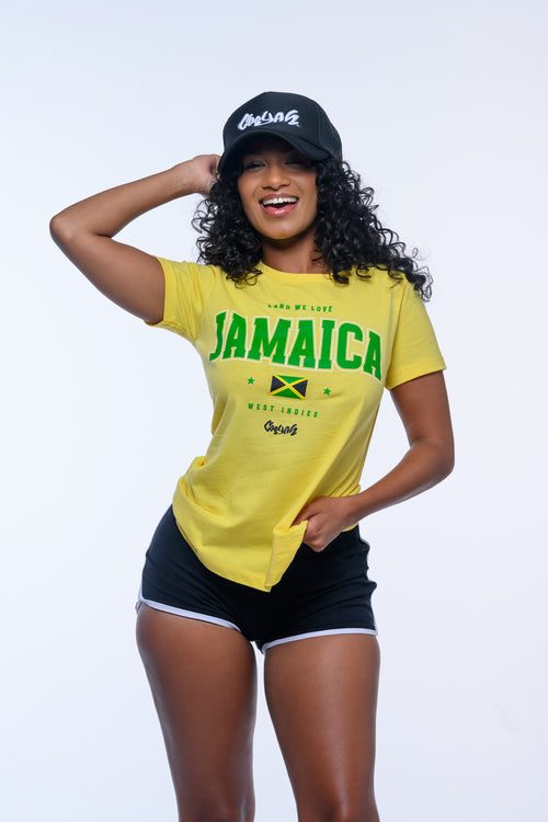 Cooyah.  Jamaica Land We Love women's graphic tee in yellow.  We are a Jamaican streetwear clothing brand.  Established in 1987.