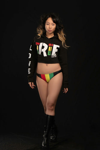 Cooyah Clothing. Irie cropped women's hoodie in black. Reggae style screen print with Love design on the sleeve. Jamaican beachwear clothing brand.
