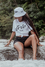 Load image into Gallery viewer, COOYAH Jamaica. Women&#39;s Irie Graphic tees and embroidered bucket hats. We are the official reggae clothing brand since 1987.
