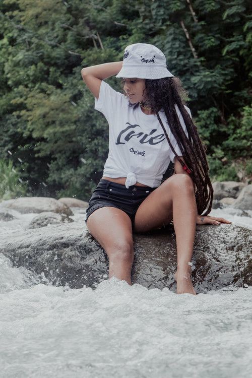 COOYAH Jamaica. Women's Irie Graphic tees and embroidered bucket hats. We are the official reggae clothing brand since 1987.