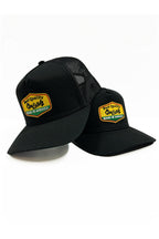 Made in Jamaica trucker hats with black, yellow, and green - Jamaican colors patches.  Cooyah Clothing