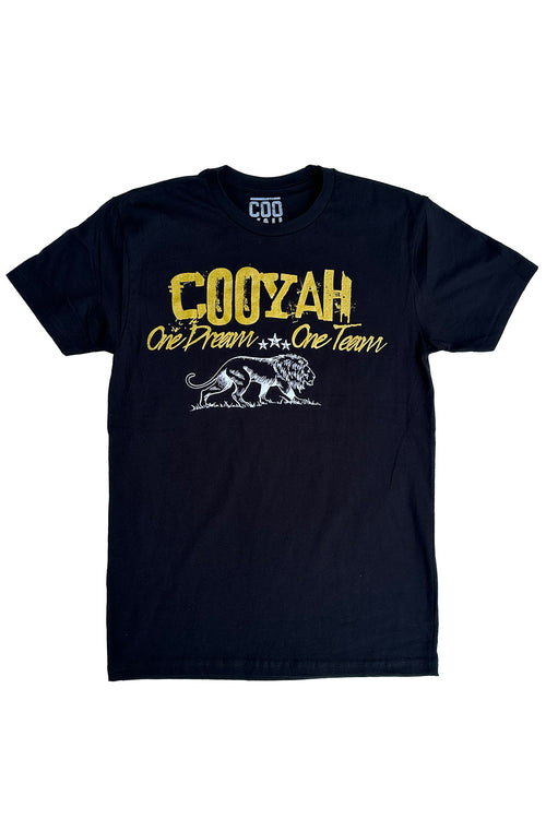 Cooyah Jamaica. One Dream, One Team, men's graphic tee in black with metallic gold lettering and white lion print.