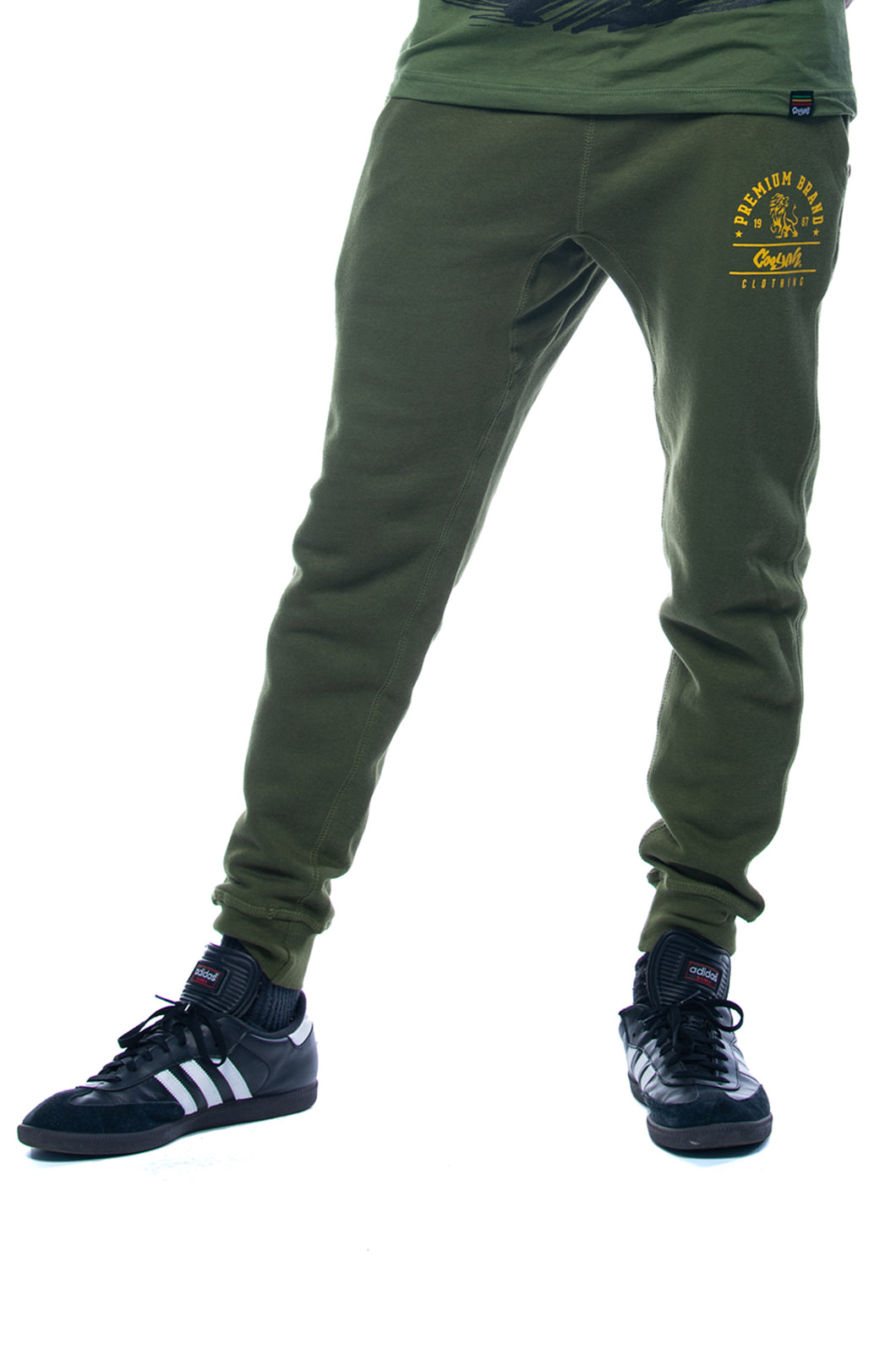 Cooyah Clothing.  Men's Premium Brand Joggers in green with Lion graphic.  Jamaican streetwear clothing brand.