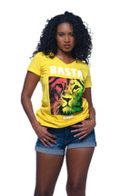 Woman wearing a Cooyah Clothing Rasta Lion yellow v-neck graphic tee with red, gold, and green lion artwork, paired with denim shorts, posing against a white background.