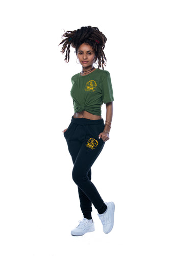 Cooyah Jamaica. Women's black joggers with gold Premium Brand Lion logo screen printed on the front.  We are a Jamaican streetwear clothing brand since 1987.  IRIE