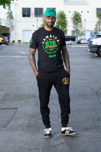 Cooyah Clothing. Men's Jamaica Area Code 876 graphic tee. Made from soft, 100% ringspun cotton. We are a Jamaican owned clothing brand established in 1987.