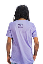 Load image into Gallery viewer, Reggae VS Babylon. Men&#39;s graphic tee in purple. Cooyah Jamaica. Men&#39;s short sleeve Reggae t-shirt. Ringspun, crew neck shirt. Jamaican streetwear clothing. IRIE
