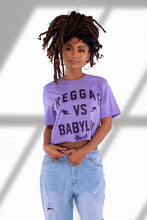 Load image into Gallery viewer, Cooyah Jamaica. Reggae VS Babylon tee in purple. Women&#39;s short sleeve, ring spun cotton t-shirt. Jamaican streetwear clothing brand.
