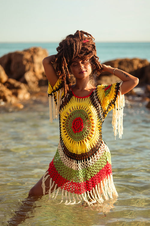 Cooyah Jamaica. Women's crochet beach Dress in reggae colors. We are a Jamaican owned swimwear clothing brand.