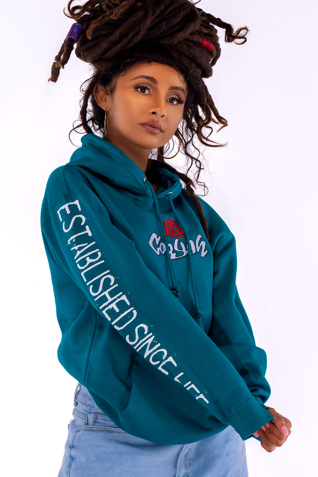 Cooyah Jamaica women's Embroidered Rose Hoodie in teal. Floral design, Jamaican streetwear clothing.