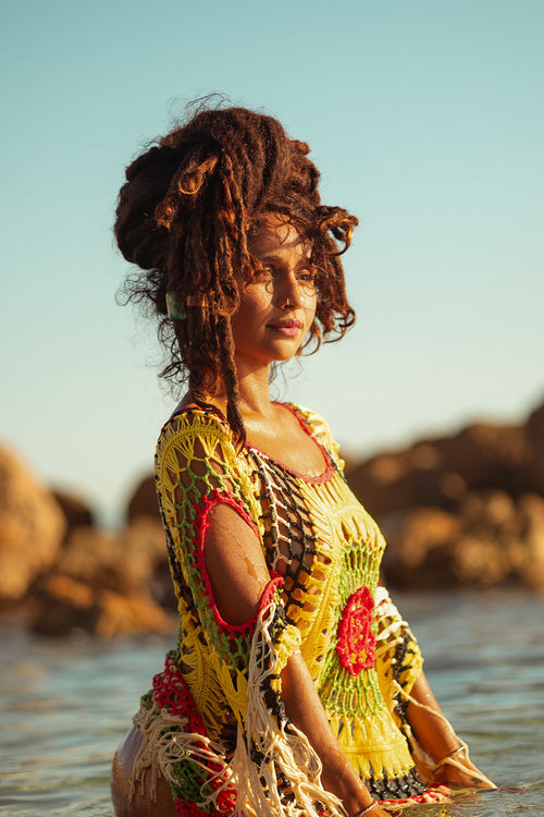 Cooyah Jamaica. Women's crochet beach Dress in rasta colors. We are a Jamaican swimwear clothing brand.