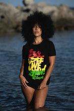 Load image into Gallery viewer, Cooyah Jamaica.  Women&#39;s black graphic tee with See We Yah Jamaican patois graphics in reggae colors.  Short sleeve, crew neck, ringspun cotton.
