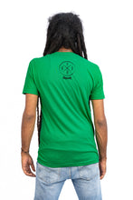 Load image into Gallery viewer, Cooyah Jamaica. Men&#39;s Simmer Down T-Shirt featuring a Rastaman on a bicycle design. Ring Spun Cotton, Short Sleeve Green Tee. Jamaican streetwear clothing brand.
