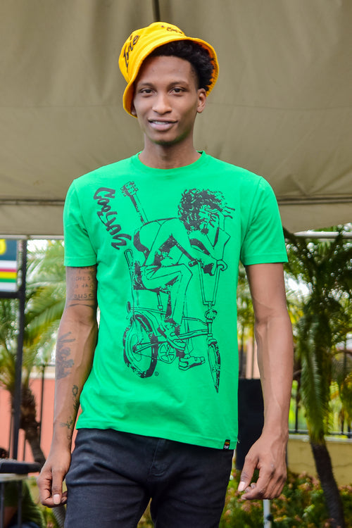 Cooyah Jamaica. Men's Simmer Down T-Shirt featuring a Rastaman on a bicycle design. Ring Spun Cotton, Short Sleeve Green Tee. Jamaican streetwear clothing brand.