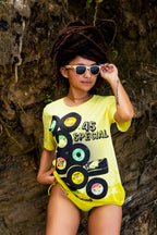 Cooyah Women's chartreuse green shirt with vintage records graphic on the front.