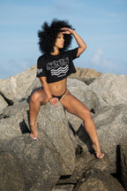  Cooyah Jamaica. Women's Seen crop top in black. Short sleeve, Ringspun cotton. Jamaican clothing brand.  IRIE