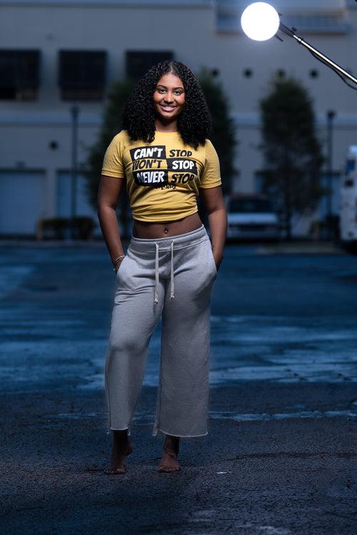 Cooyah women's Can't Stop, Won't Stop statement tee in yellow.  Screen printed on soft, ringspun cotton with a relaxed fit.