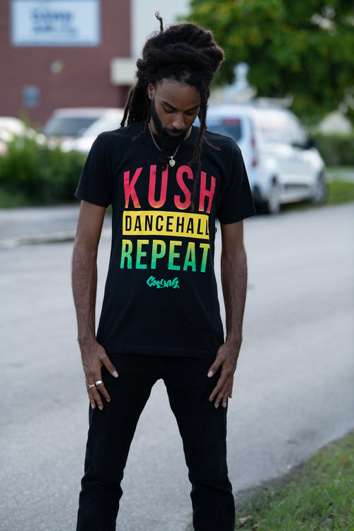 Cooyah Jamaica. Men's Kush, Dancehall graphic tee in black. Screen printed with rasta colors design. Jamaican Clothing Brand. IRIE