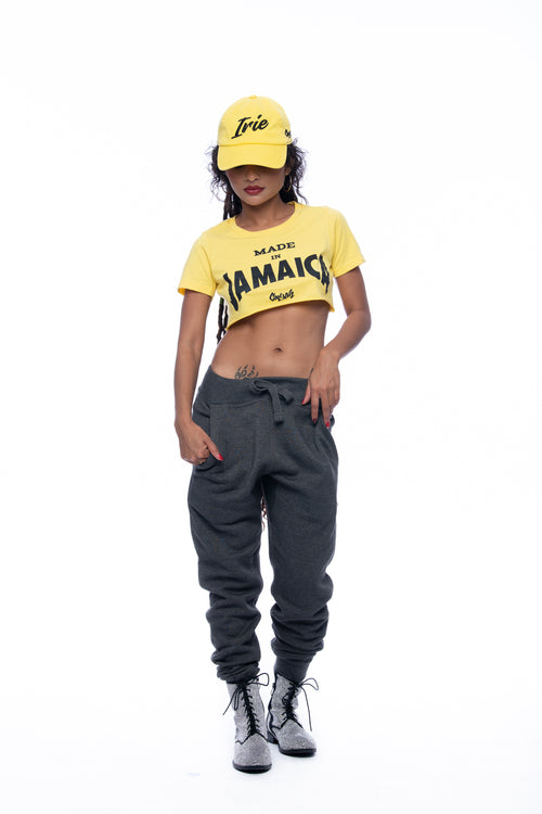 Cooyah Women's yellow made in Jamaica cropped t-shirt.  As a Jamaican owned clothing brand since 1987, we take pride in bringing you this classic top.