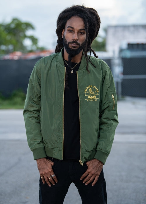 Cooyah Clothing - Men's Premium Brand Bomber Jacket in olive green.  Original Lion design screen printed at Cooyah Studio.  We are Jamaican streetwear clothing brand established in 1987