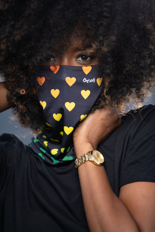 These Cooyah brand gaiters are the perfect fit for outdoor activities. They are multifunctional and can be worn as a scarf, headband, or mask to keep dust from your face. One Love, reggae heart design.