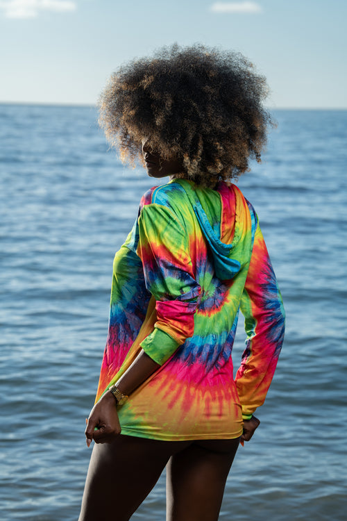 Cooyah Jamaica. This colorful Irie tie-dye UV protected hoodie is great for the beach and traveling - helps you stay cool and protected year-round! Jamaican beachwear clothing brand.