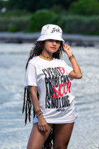 Cooyah Jamaica. I've Got 99 Problems and Soca is Not One. Women's Ringspun cotton, short sleeve graphic tee in white. Jamaican clothing brand.