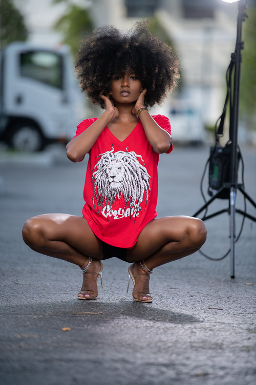 Cooyah Jamaica - Women's red v-neck graphic tee with Rasta Lion Dreads design.  As a Jamaican owned clothing brand since 1987, we take pride in bringing you this classic piece. Don't wait, get yours now!